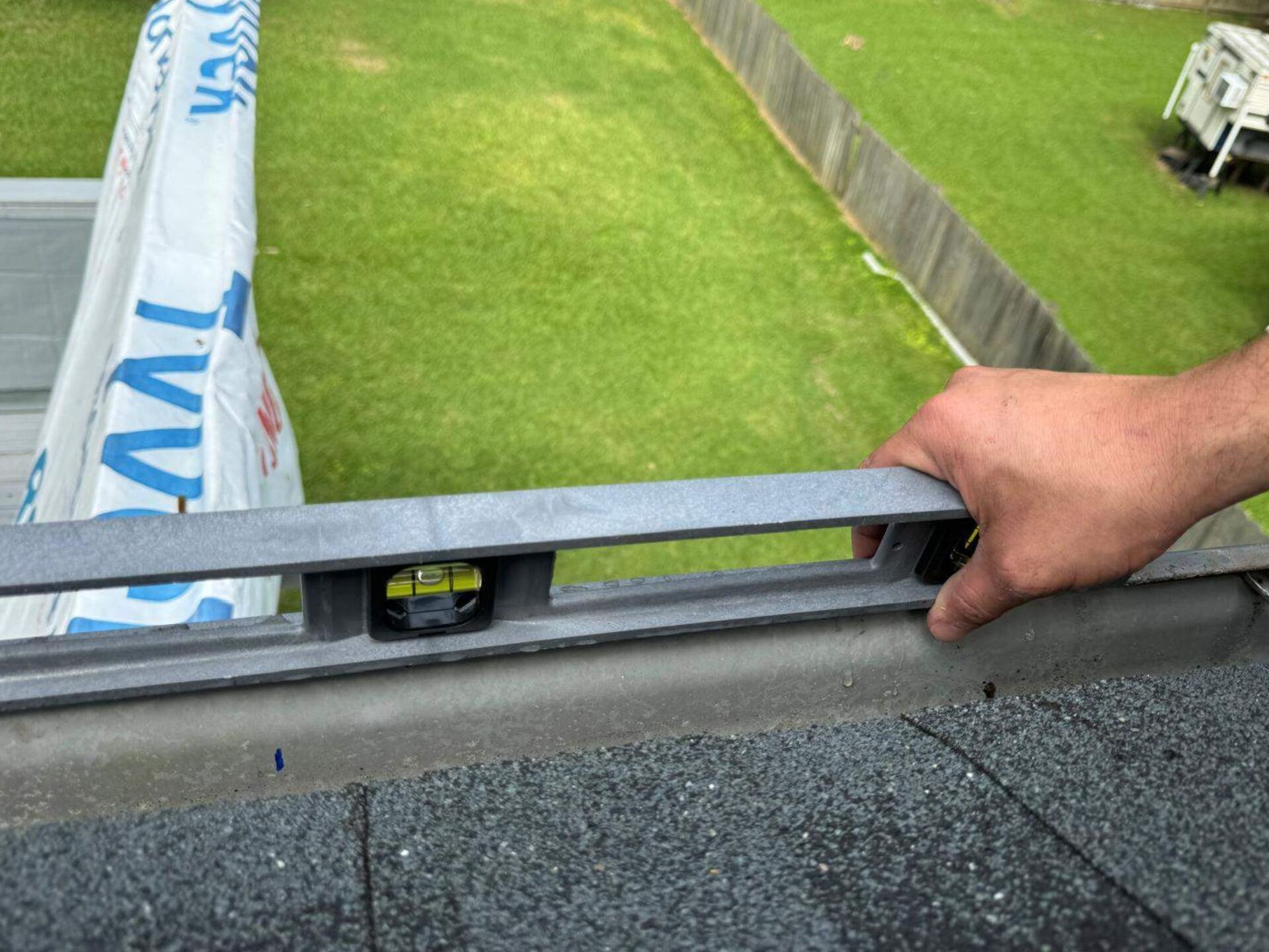 Structural Engineer using tools for the roof measurement